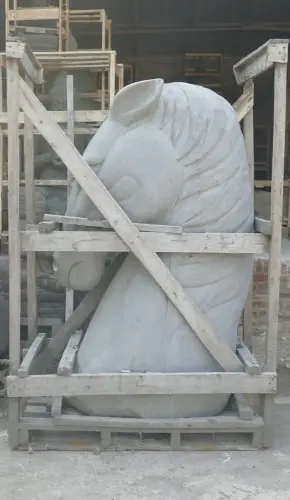 Product image of the product “Head of a Horse made from Riverstone, looking down. 195cm Height. ”